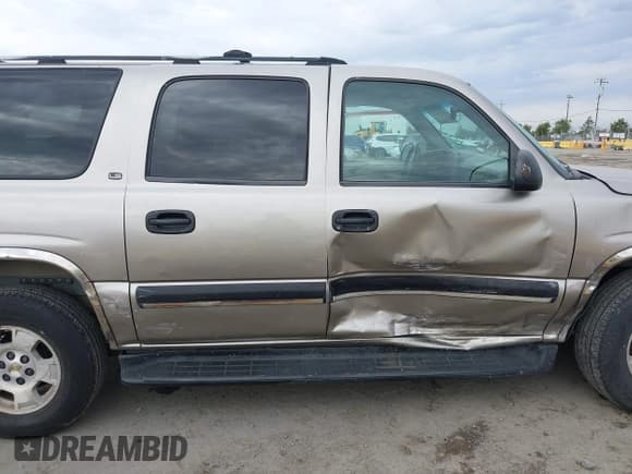 ✅ 2001 Chevrolet Suburban LT • VIN: 3GNEC16T21G248839 • Lot: 43263451. Wystawiony na IAAI z przebiegiem 238 937 mil. Bezpłatny archiwum sprzedaży aukcyjnych z USA i szczegółowy raport historii pojazdu na DreamBid. Zdjęcie 13.