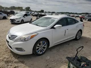 ✅ 2013 Hyundai Azera • VIN: KMHFG4JGXDA199367 • Лот: 82405005. Опубликован ранее на Copart с пробегом 215 300 миль. Бесплатный доступ к архиву аукционных продаж из США и подробный отчёт об истории автомобиля на DreamBid. Изображение 1.