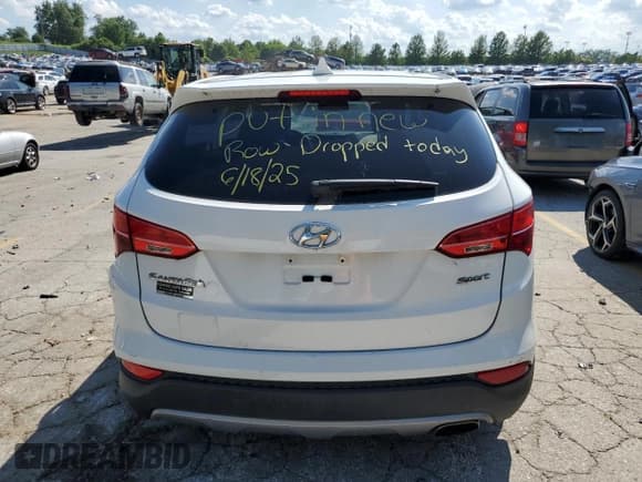 ✅ 2014 Hyundai Santa Fe • VIN: 5XYZT3LB9EG161445 • Лот: 61599605. Опубликован ранее на Copart с пробегом Не указан. Бесплатный доступ к архиву аукционных продаж из США и подробный отчёт об истории автомобиля на DreamBid. Изображение 6.