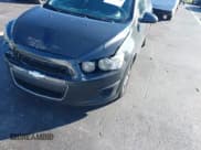 ✅ 2014 Chevrolet Sonic LT • VIN: 1G1JC5SH7E4188357 • Lot: 43746984. Listed on IAAI with 149,212 mi. Free auction sales archive from the USA and detailed vehicle history report at DreamBid. Image 6.