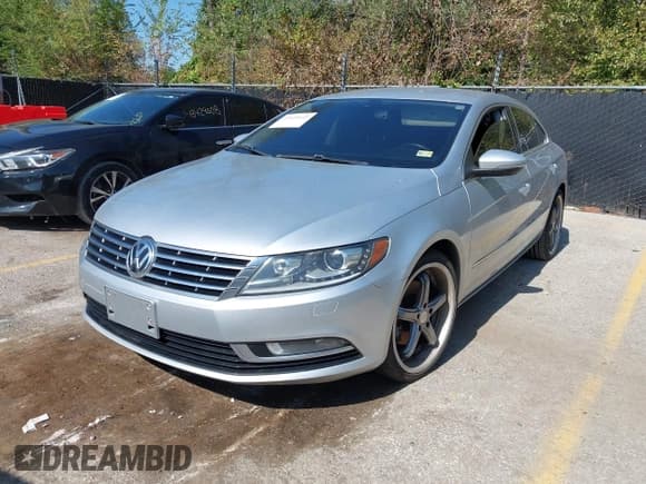 ✅ 2013 Volkswagen CC R-Line • VIN: WVWBP7AN4DE515437 • Lot: 43420145. Listed on IAAI with 101,522 mi. Free auction sales archive from the USA and detailed vehicle history report at DreamBid. Image 2.