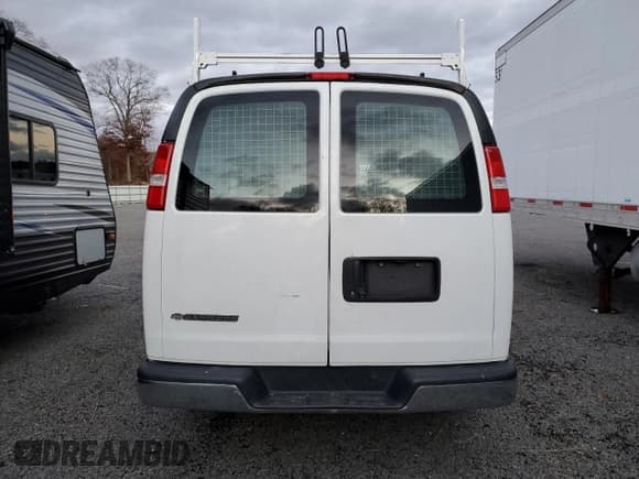 ✅ 2020 Chevrolet Express Cargo • VIN: 1GCWGAFP7L1257610 • Lot: 90265295. Listed on Copart with Not provided. Free auction sales archive from the USA and detailed vehicle history report at DreamBid. Image 6.