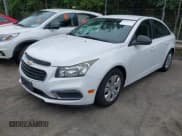 ✅ 2016 Chevrolet Cruze LS • VIN: 1G1PB5SGXG7173440 • Lot: 42995735. Listed on IAAI with 122,550 mi. Free auction sales archive from the USA and detailed vehicle history report at DreamBid. Image 2.