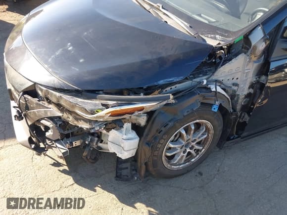 ✅ 2022 Toyota Prius LE • VIN: JTDKAMFP5N3225781 • Lot: 40822065. Listed on IAAI with 42,307 mi. Free auction sales archive from the USA and detailed vehicle history report at DreamBid. Image 6.