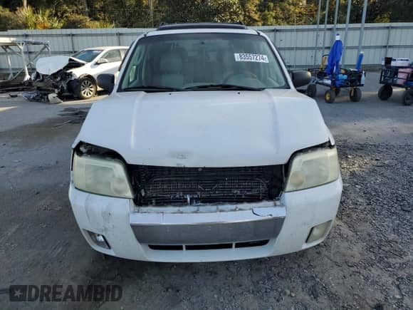 2006 Mercury Mariner Luxury с VIN 4M2CU56176DJ03331, выставлен на аукционе Copart как лот 83557274 с пробегом 291 468 миль миль и Списание • Salvage title. История ставок и продаж доступна на DreamBid. Изображение 5.