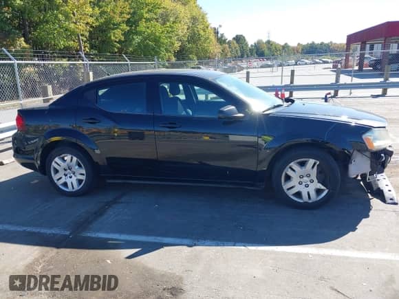 2013 Dodge Avenger SE with VIN 1C3CDZAB8DN677218, listed as a IAAI auction lot 43470109 with 140,223 mi miles and . Bid and sale history available at DreamBid. Image 14.