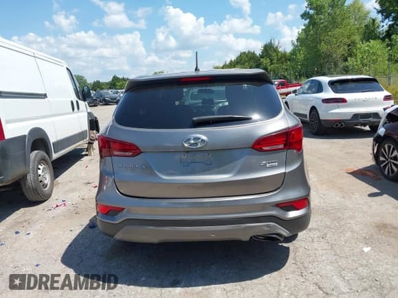 ✅ 2018 Hyundai Santa Fe 2.4L • VIN: 5NMZTDLB4JH107766 • Лот: 43043034. Опубликован ранее на IAAI с пробегом 93 208 миль. Бесплатный доступ к архиву аукционных продаж из США и подробный отчёт об истории автомобиля на DreamBid. Изображение 17.