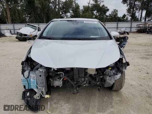 2021 Toyota Prius L Eco with VIN JTDKAMFU4M3139334, listed as a Copart auction lot 84025305 with 59,418 mi miles and Salvage title. Bid and sale history available at DreamBid. Image 5.