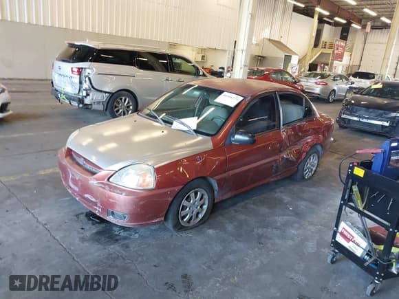 ✅ 2004 Kia Rio • VIN: KNADC125846331142 • Лот: 41982947. Опубликован ранее на IAAI с пробегом 181 904 миль. Бесплатный доступ к архиву аукционных продаж из США и подробный отчёт об истории автомобиля на DreamBid. Изображение 2.