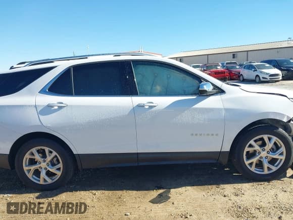 ✅ 2021 Chevrolet Equinox Premier • VIN: 3GNAXXEV2MS106680 • Лот: 43481192. Опубликован ранее на IAAI с пробегом 61 530 миль. Бесплатный доступ к архиву аукционных продаж из США и подробный отчёт об истории автомобиля на DreamBid. Изображение 13.