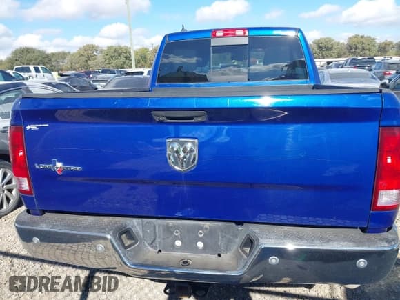 ✅ 2015 Ram 1500 SLT • VIN: 1C6RR6GG4FS615061 • Lot: 43480414. Listed on IAAI with 117,255 mi. Free auction sales archive from the USA and detailed vehicle history report at DreamBid. Image 16.