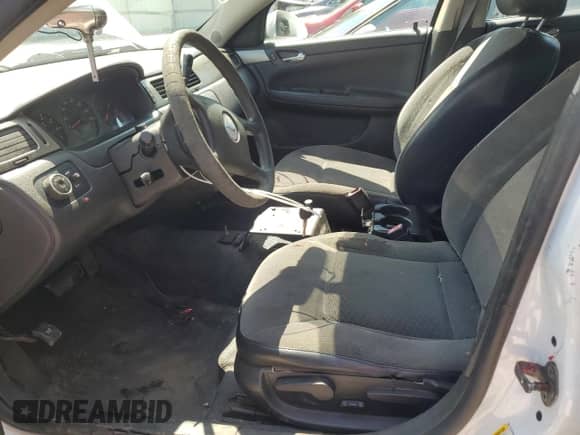 2013 Chevrolet Impala Police with VIN 2G1WD5E32D1221309, listed as a Copart auction lot 58130175 with 123,107 mi miles and Salvage title. Bid and sale history available at DreamBid. Image 7.