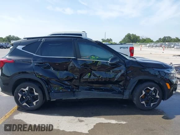 ✅ 2025 Kia Seltos EX • VIN: KNDER2AAXS7714100 • Lot: 42731201. Listed on IAAI with Not provided. Free auction sales archive from the USA and detailed vehicle history report at DreamBid. Image 12.