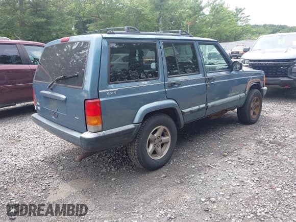 ✅ 1999 Jeep Cherokee Sport • VIN: 1J4FF68S3XL608860 • Lot: 42777688. Listed on IAAI with 248,505 mi. Free auction sales archive from the USA and detailed vehicle history report at DreamBid. Image 4.