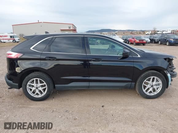 ✅ 2023 Ford Edge SEL • VIN: 2FMPK4J90PBA23490 • Lot: 43799151. Wystawiony na IAAI z przebiegiem 143 023 mil. Bezpłatny archiwum sprzedaży aukcyjnych z USA i szczegółowy raport historii pojazdu na DreamBid. Zdjęcie 14.