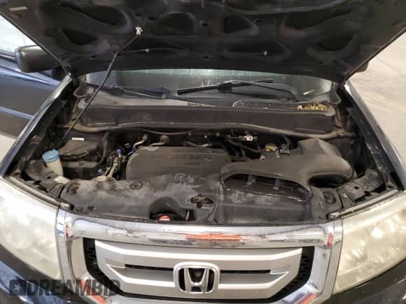 2010 Honda Pilot LX with VIN 5FNYF4H26AB031724, listed as a Copart auction lot 64199905 with 205,743 mi miles and Salvage title. Bid and sale history available at DreamBid. Image 12.