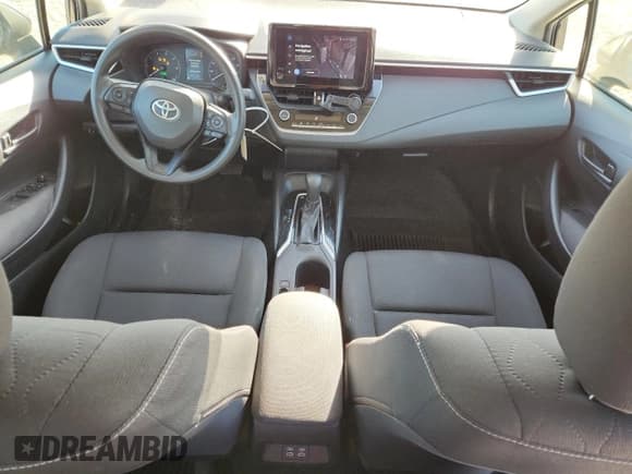 ✅ 2023 Toyota Corolla Hybrid LE • VIN: JTDBCMFE4PJ002459 • Лот: 86511125. Опубликован ранее на Copart с пробегом 58 203 миль. Бесплатный доступ к архиву аукционных продаж из США и подробный отчёт об истории автомобиля на DreamBid. Изображение 8.