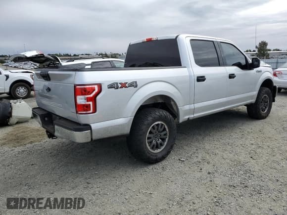 ✅ 2018 Ford F-150 XLT • VIN: 1FTEW1E57JKE80297 • Lot: 84462875. Listed on Copart with 126,670 mi. Free auction sales archive from the USA and detailed vehicle history report at DreamBid. Image 3.