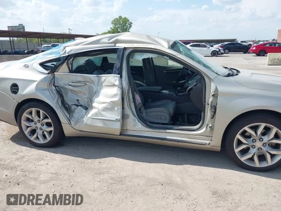 ✅ 2015 Chevrolet Impala LTZ • VIN: 2G1165S35F9106202 • Lot: 43071546. Wystawiony na IAAI z przebiegiem 145 620 mil. Bezpłatny archiwum sprzedaży aukcyjnych z USA i szczegółowy raport historii pojazdu na DreamBid. Zdjęcie 6.