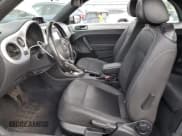 ✅ 2014 Volkswagen Beetle 2.0L TDI • VIN: 3VW5L7AT9EM813384 • Lot: 81159585. Listed on Copart with 117,083 mi. Free auction sales archive from the USA and detailed vehicle history report at DreamBid. Image 7.