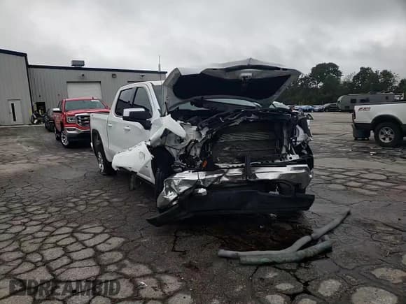 ✅ 2023 GMC Sierra 1500 SLE • VIN: 1GTUUBED4PZ121018 • Лот: 83947735. Опубликован ранее на Copart с пробегом 51 484 миль. Бесплатный доступ к архиву аукционных продаж из США и подробный отчёт об истории автомобиля на DreamBid. Изображение 14.