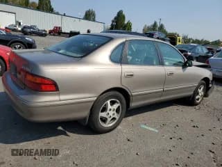 ✅ 1999 Toyota Avalon XL • VIN: 4T1BF18B5XU296408 • Лот: 69834614. Опубликован ранее на Copart с пробегом 265 573 миль. Бесплатный доступ к архиву аукционных продаж из США и подробный отчёт об истории автомобиля на DreamBid. Изображение 3.