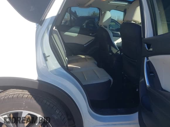 ✅ 2016 Mazda CX-5 Grand Touring • VIN: JM3KE4DY6G0864294 • Lot: 43639964. Wystawiony na IAAI z przebiegiem 119 285 mil. Bezpłatny archiwum sprzedaży aukcyjnych z USA i szczegółowy raport historii pojazdu na DreamBid. Zdjęcie 8.