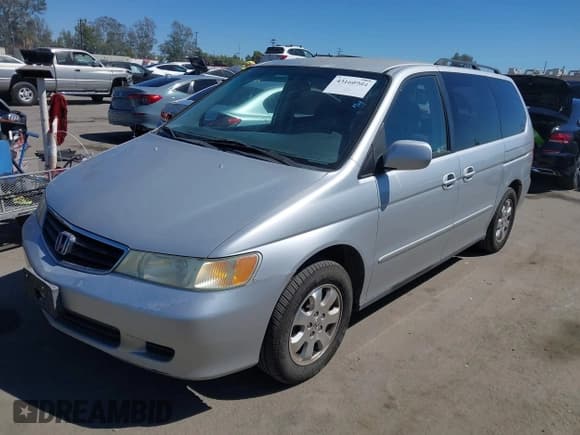 ✅ 2004 Honda Odyssey EX-RES • VIN: 5FNRL18884B110770 • Lot: 43160984. Listed on IAAI with 207,778 mi. Free auction sales archive from the USA and detailed vehicle history report at DreamBid. Image 2.