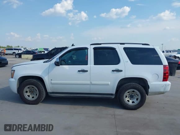 ✅ 2007 Chevrolet Tahoe LS • VIN: 1GNFC13C87R286352 • Lot: 42927693. Wystawiony na IAAI z przebiegiem 268 163 mil. Bezpłatny archiwum sprzedaży aukcyjnych z USA i szczegółowy raport historii pojazdu na DreamBid. Zdjęcie 14.