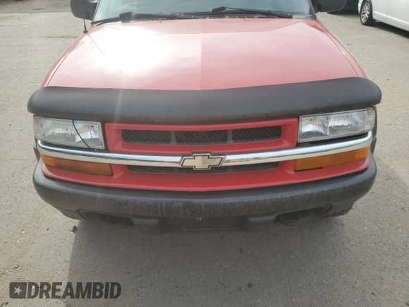 2000 Chevrolet Blazer LS z VIN 1GNCT18W8YK155812, wystawiony jako Copart lot #77315424 z przebiegiem 151 418 mil mil oraz Czysty tytuł • Clean title. Historia ofert i sprzedaży dostępna na DreamBid. Obrazek 11.