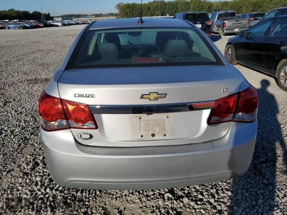 2013 Chevrolet Cruze 2LT с VIN 1G1PE5SB4D7276778, выставлен на аукционе Copart как лот 87038735 с пробегом 151 647 миль миль и Списание • Salvage title. История ставок и продаж доступна на DreamBid. Изображение 6.