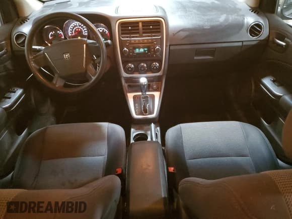 ✅ 2010 Dodge Caliber SXT • VIN: 1B3CB4HA1AD662757 • Lot: 81899934. Wystawiony na Copart z przebiegiem 128 801 mil. Bezpłatny archiwum sprzedaży aukcyjnych z USA i szczegółowy raport historii pojazdu na DreamBid. Zdjęcie 8.