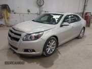 ✅ 2013 Chevrolet Malibu LTZ • VIN: 1G11H5SA5DF179700 • Lot: 43591171. Listed on IAAI with 148,979 mi. Free auction sales archive from the USA and detailed vehicle history report at DreamBid. Image 16.