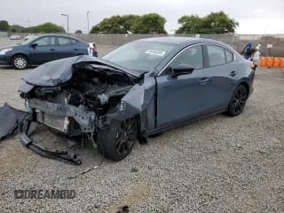 ✅ 2022 Mazda 3 Carbon Edition • VIN: 3MZBPACL2NM305128 • Lot: 60496095. Listed on Copart with Not provided. Free auction sales archive from the USA and detailed vehicle history report at DreamBid. Image 1.