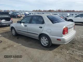 ✅ 2000 Suzuki Esteem GL • VIN: JS2GB41S8Y5184253 • Lot: 91134435. Wystawiony na Copart z przebiegiem 66 688 mil. Bezpłatny archiwum sprzedaży aukcyjnych z USA i szczegółowy raport historii pojazdu na DreamBid. Zdjęcie 2.