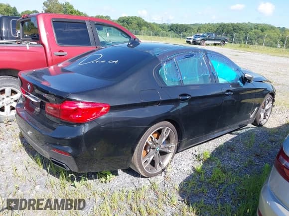 ✅ 2018 BMW 5 Series M550i xDrive • VIN: WBAJB9C59JB286170 • Lot: 42726658. Listed on IAAI with Not provided. Free auction sales archive from the USA and detailed vehicle history report at DreamBid. Image 4.