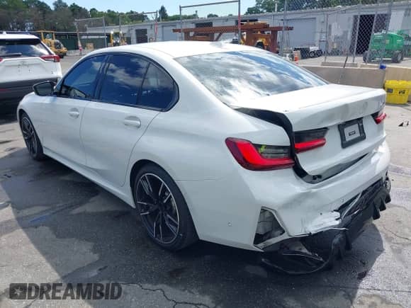 2023 BMW 3 Series M340i with VIN 3MW49FS00P8D11321, listed as a IAAI auction lot 42794821 with 46,037 mi miles and . Bid and sale history available at DreamBid. Image 3.