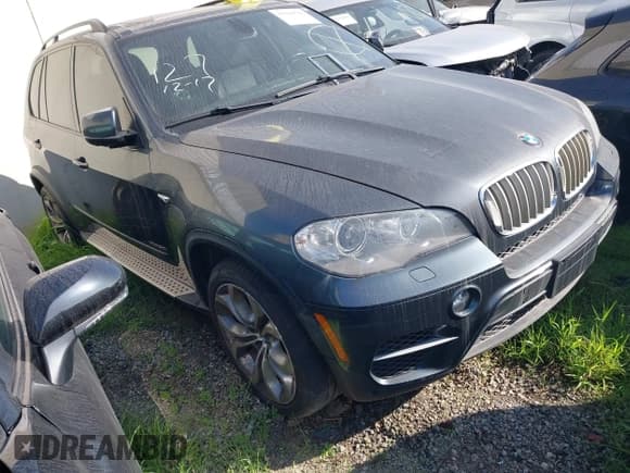 ✅ 2012 BMW X5 50i • VIN: 5UXZV8C50CL424522 • Lot: 43210782. Listed on IAAI with 101,221 mi. Free auction sales archive from the USA and detailed vehicle history report at DreamBid. Image 1.
