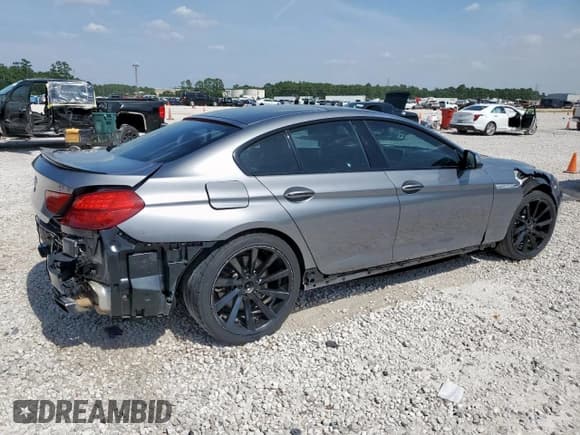 ✅ 2017 BMW 6 Series 650i • VIN: WBA6D4C50HD977699 • Lot: 65942645. Listed on Copart with 91,744 mi. Free auction sales archive from the USA and detailed vehicle history report at DreamBid. Image 3.