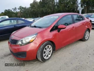 ✅ 2013 Kia Rio LX • VIN: KNADM4A36D6225853 • Lot: 90088885. Wystawiony na Copart z przebiegiem 129 662 mil. Bezpłatny archiwum sprzedaży aukcyjnych z USA i szczegółowy raport historii pojazdu na DreamBid. Zdjęcie 1.