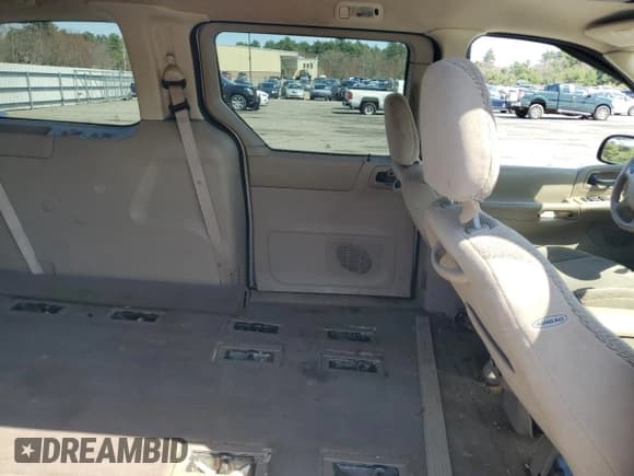 ✅ 2003 Ford Windstar SE • VIN: 2FMDA52473BB10747 • Лот: 54301075. Опубликован ранее на Copart с пробегом 74 513 миль. Бесплатный доступ к архиву аукционных продаж из США и подробный отчёт об истории автомобиля на DreamBid. Изображение 11.