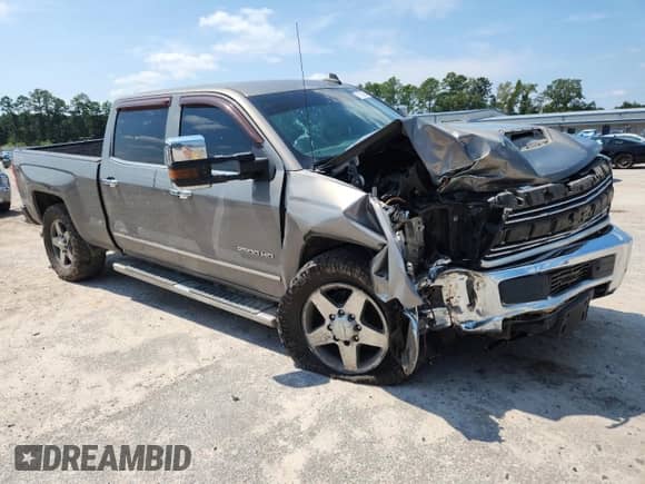 2017 Chevrolet Silverado 2500HD LTZ с VIN 1GC1KWEY4HF156440, выставлен на аукционе Copart как лот 71732905 с пробегом 180 327 миль миль и Списание • Salvage title. История ставок и продаж доступна на DreamBid. Изображение 4.