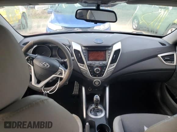 2013 Hyundai Veloster w/Gray Int с VIN KMHTC6ADXDU098117, выставлен на аукционе Copart как лот 74143514 с пробегом Не указан миль и Списание • Salvage title. История ставок и продаж доступна на DreamBid. Изображение 8.