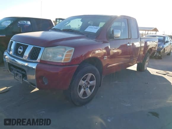 ✅ 2004 Nissan Titan XE • VIN: 1N6AA06A44N544167 • Lot: 43667008. Listed on IAAI with 209,919 mi. Free auction sales archive from the USA and detailed vehicle history report at DreamBid. Image 2.