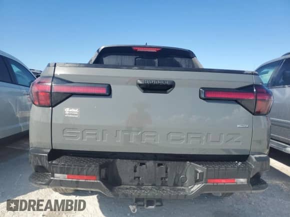 2024 Hyundai Santa Cruz SEL с VIN 5NTJCDDE7RH124941, выставлен на аукционе Copart как лот 75405364 с пробегом 1 304 миль миль и На запчасти • Non repairable. История ставок и продаж доступна на DreamBid. Изображение 6.