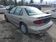 ✅ 2001 Pontiac Sunfire SE • VIN: 1G2JB524817130195 • Lot: 41626711. Wystawiony na IAAI z przebiegiem 199 141 mil. Bezpłatny archiwum sprzedaży aukcyjnych z USA i szczegółowy raport historii pojazdu na DreamBid. Zdjęcie 3.