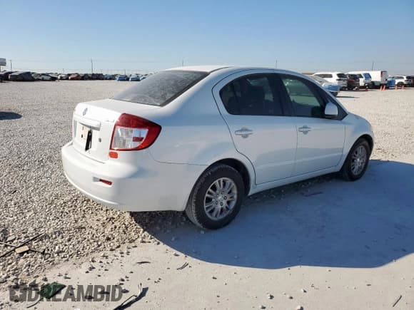 ✅ 2012 Suzuki SX4 LE • VIN: JS2YC5A37C6303297 • Lot: 91703025. Wystawiony na Copart z przebiegiem 113 870 mil. Bezpłatny archiwum sprzedaży aukcyjnych z USA i szczegółowy raport historii pojazdu na DreamBid. Zdjęcie 3.
