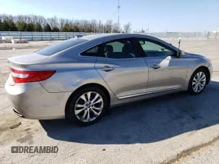 ✅ 2013 Hyundai Azera • VIN: KMHFG4JG8DA256908 • Лот: 50573915. Опубликован ранее на Copart с пробегом 146 015 миль. Бесплатный доступ к архиву аукционных продаж из США и подробный отчёт об истории автомобиля на DreamBid. Изображение 3.