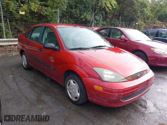 ✅ 2004 Ford Focus LX • VIN: 1FAFP33PX4W121241 • Лот: 43234051. Опубликован ранее на IAAI с пробегом 66 258 миль. Бесплатный доступ к архиву аукционных продаж из США и подробный отчёт об истории автомобиля на DreamBid. Изображение 1.