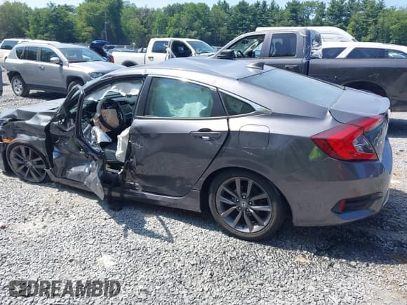 ✅ 2021 Honda Civic EX-L • VIN: 2HGFC1F7XMH704169 • Lot: 42950889. Listed on IAAI with 19,729 mi. Free auction sales archive from the USA and detailed vehicle history report at DreamBid. Image 14.